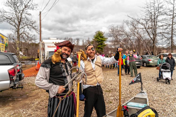 Andrew Cummings and Nicholas Salvadore show off their pirate garb, complete with rats, for the 59th running of the River Rat Race from Athol to Orange on Saturday.