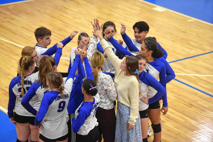 The Turners volleyball team huddles between sets during a match against West Springfield on Monday in Turners. 