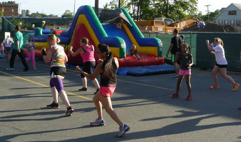 Kids enjoy a sample of zumba and the inflatable obstacle course at a past event hosted by Franklin County’s YMCA. The Y will host its annual Healthy Kids Day on Saturday, April 20, at 11 a.m.