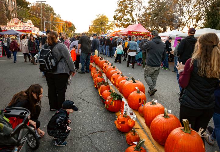 Hundreds of carved and decorated pumpkins line Avenue A during the 10th annual Great Falls Festival in Turners Falls in 2019. Although 2022 marked the final year of the traditional Great Falls Festival, a new group of  organizers has banded together to put on a unique version that pays homage to its predecessor on Oct. 21.