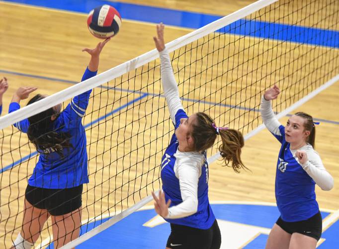 Turners Falls’ Madi Liimatainen (11) battles at the net with Hopedale’s Liv Barroso (12) during the Thunder’s 3-0 sweep of Hopedale in the MIAA Division 5 quarterfinal round on Thursday in Turners Falls.