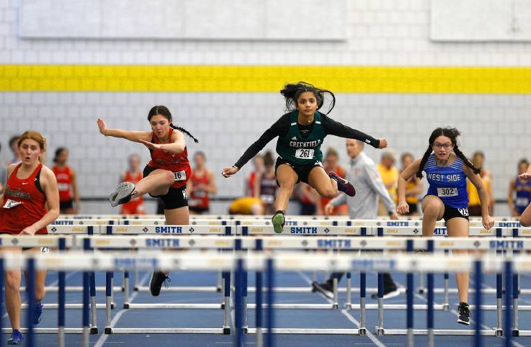 Greenfield’s Suhani Patel competes in the 55 meter hurdles during the PVIAC indoor track meet Wednesday at Smith College in Northampton.