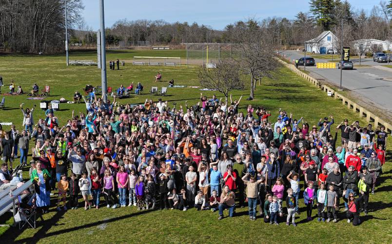 A group photo at the eclipse-viewing event held at Pioneer Valley Regional School on Monday.