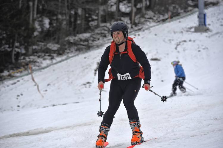 A team member of Clayton’s Way makes their way down the mountain during the ski portion of the Berkshire Highlands Pentathlon at Berkshire East on Saturday. 