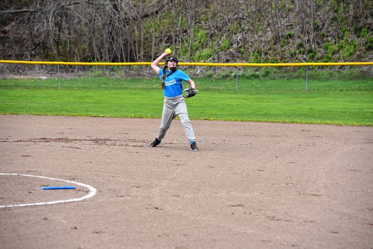 Descavich Plumbing’s Lexi Berry makes the throw from short during a game against Triton Automotive on Saturday at Murphy Park. 