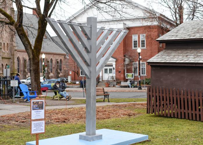 A Hanukkah menorah has been erected next to the creche on the Greenfield Common.