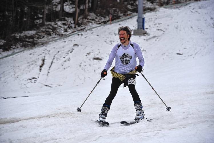 Zach Livingston cheers after completing the ski portion of the Berkshire Highlands Pentathlon at Berkshire East on Saturday.