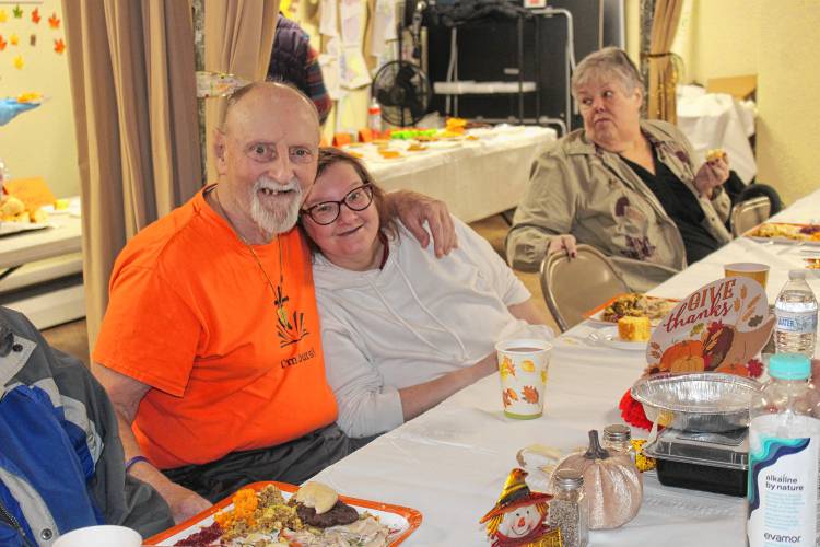 John Joseph Szramowski and his granddaughter, Jennifer White, at Living Waters Assembly of God’s Thanksgiving meal.