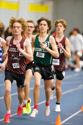 Greenfield’s Jackson Caron runs to a third place finish in the one mile during the PVIAC indoor track meet Wednesday at Smith College in Northampton.