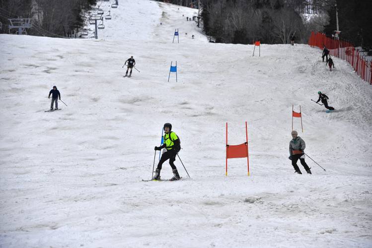 Competitors make their way down the mountain during the Berkshire Highlands Pentathlon at Berkshire East on Saturday. 