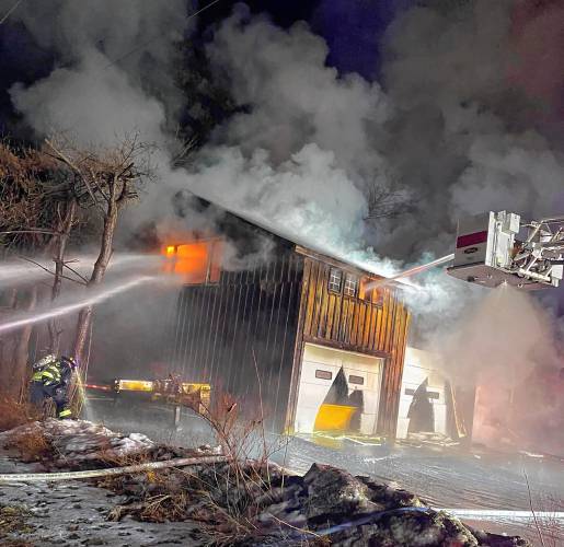 Firefighters from Greenfield and surrounding towns responded to a first-alarm fire at a commercial garage at 130 Laurel St. late Saturday night.