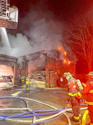 Firefighters from Greenfield and surrounding towns responded to a first-alarm fire at a commercial garage at 130 Laurel St. late Saturday night.