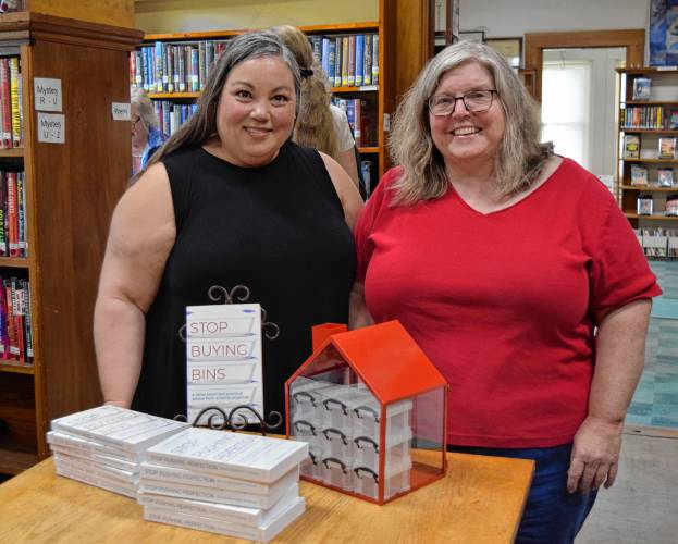 Professional organizer Bonnie Borromeo Tomlinson (left) and Tyler Memorial Library Director Kim Gabert at the library for the discussion on organization.