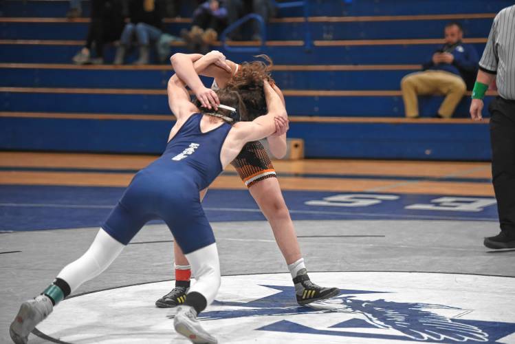 Franklin Tech’s Maxon Brunette goes for the takedown against South Hadley’s Graicyn Drew on Friday in Turners Falls.  