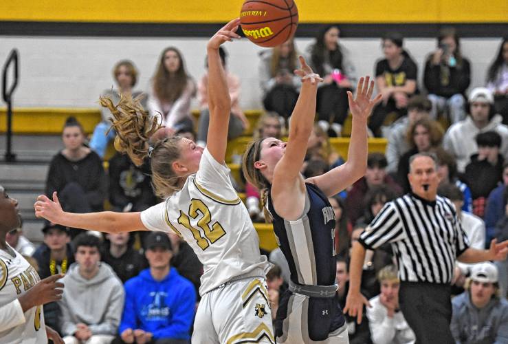 Pioneer’s Hailey Ring (12) blocks a shot from Franklin Tech’s Hannah Gilbert during Franklin County League South action Friday at Messer Gymnasium in Northfield. 