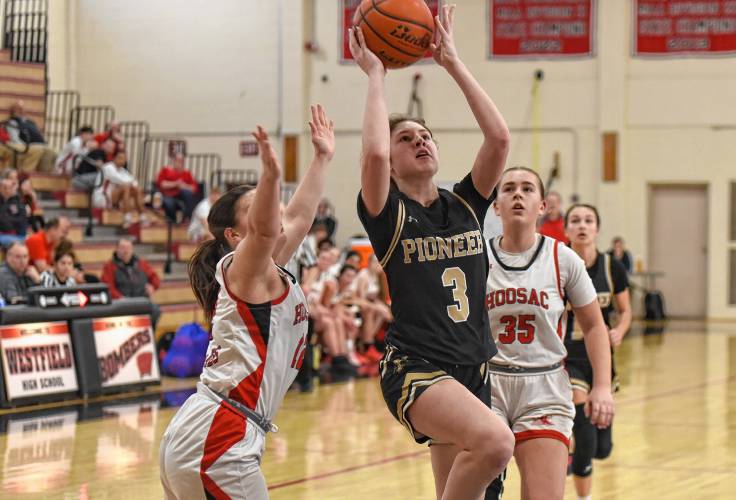 Pioneer’s Addie Harrington (3) drives to the basket against Hoosac Valley during the Panthers’ 57-35 loss in the Western Mass. Class D championship game on Saturday at Westfield High School.