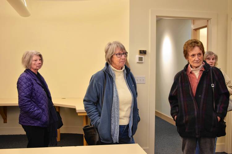 Local residents taking a tour of the building Sunderland may purchase and turn into the South County Senior Center.