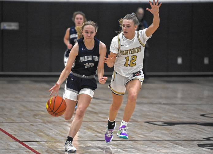 Franklin Tech’s Kyra Goodell (10), left, dribbles while defended by Pioner’s Hailey Ring (12) during the visiting Eagles’ 41-36 Franklin County League South victory on Friday at Messer Gymnasium in Northfield.
