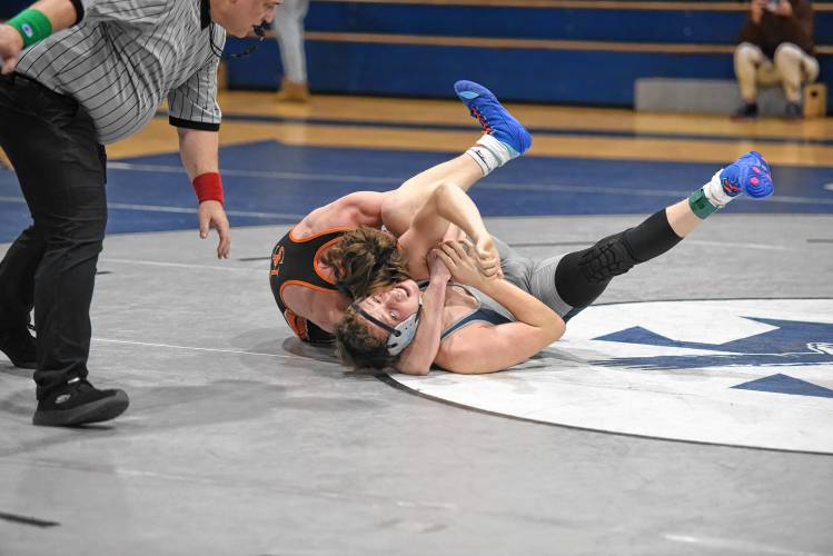 South Hadley’s Brayden Koske looks to secure a pin against Franklin Tech’s Jackson Morey on Friday in Turners Falls. 