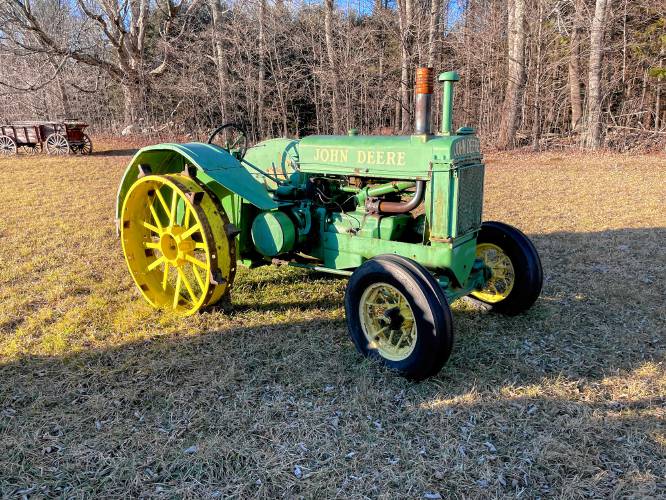 The 1937 John Deere Model AR owned by Jane and Jon Severance has the same motor as a Model A, but its front end is non-adjustable. The R in AR stands for regular.