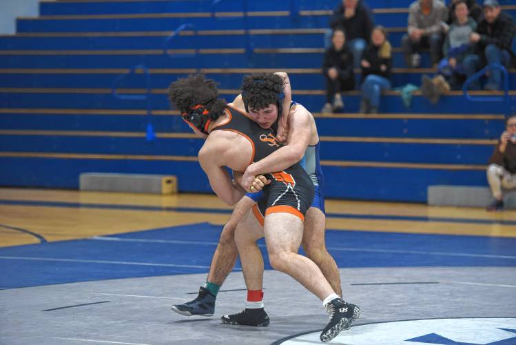 South Hadley’s Josiel Ramos (left) competes against Franklin Tech’s Izaya Romer (right) on Friday in Turners Falls. 