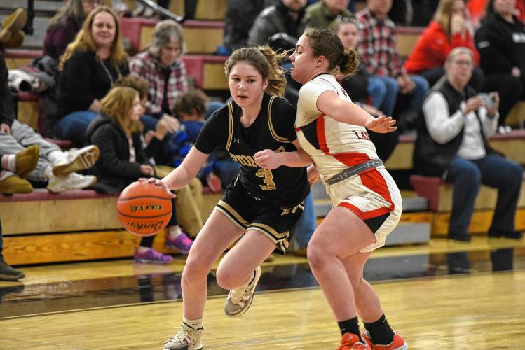 Pioneer’s Addie Harrington (3) dribbles against Hoosac Valley during the Panthers’ 57-35 loss in the Western Mass. Class D championship game on Saturday at Westfield High School.