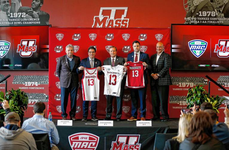 UMass football head coach Don Brown, from left, Chancellor Javier Reyes, MAC commissioner Dr. Jon Steinbrecher, Director of Athletics Ryan Bamford and men’s basketball head coach Frank Martin during a press conference at the Martin Jacobson Football Performance Center on Thursday regarding the University of Massachusetts joining the Mid-American Conference.