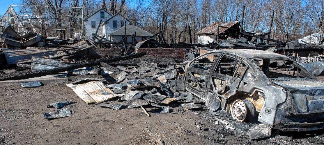Red Fire Farm in Granby is seen on Monday following a fire on Saturday afternoon.