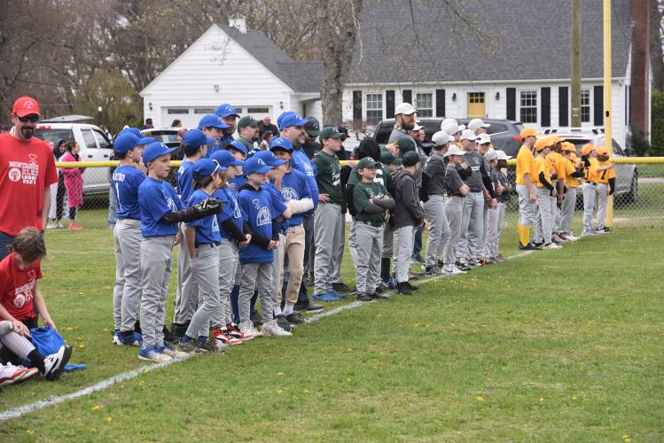 Newt Guilbault players during the Opening Day ceremony on Sunday. 