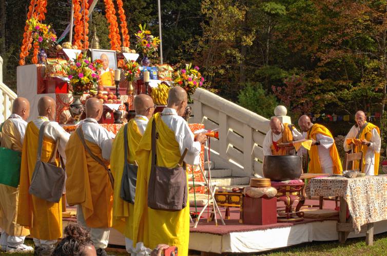 Monks of the Nipponzan-Myōhōji order participate in the 38th anniversary celebration for the New England Peace Pagoda in Leverett on Sunday.