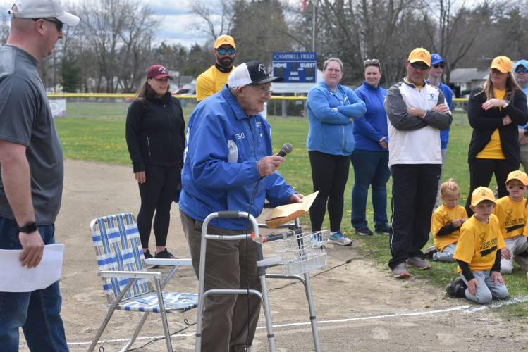 George Bush delivers a speech after being named a lifetime coach in the Newt Guilbault League on Sunday. 