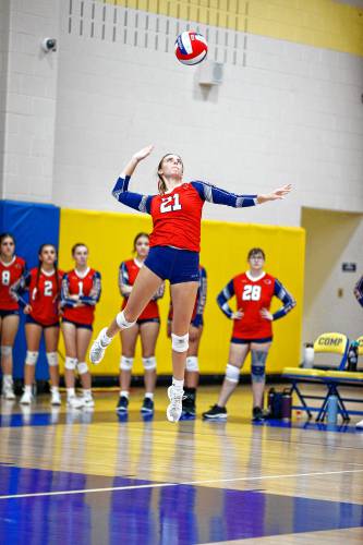 Frontier’s Olivia Machon (21) serves against Baystate Academy in the third set of the Western Mass. Class B girls volleyball final earlier this season at Chicopee Comp.