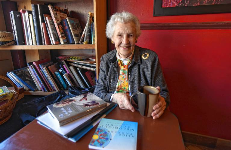 Hawley resident Alice Parker, pictured having tea at Mocha Maya’s in Shelburne Falls in 2019, has died at the age of 98.