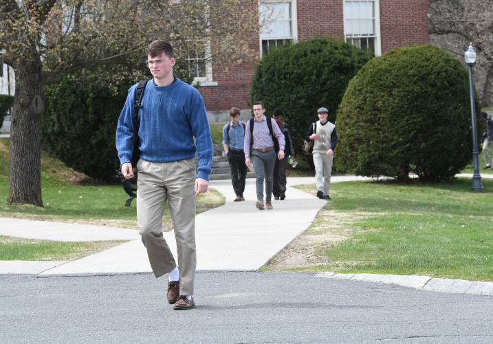 Students at Thomas Aquinas College in Northfield pass between classes in April 2022. In the 2024 edition of its annual college guide, The Princeton Review notes that Thomas Aquinas College students are among the “happiest,” “friendliest” and “most religious” in the United States.