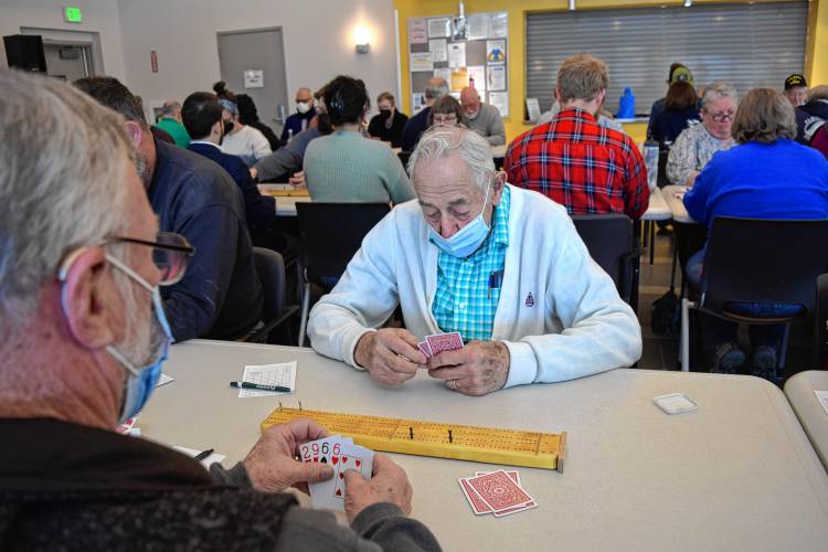 Bernardston resident Russell Deane participates in Saturday’s cribbage tournament as part of the 102nd annual Winter Carnival in Greenfield.