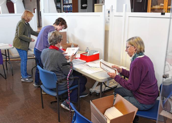 Members of the League of Women Voters have been volunteering their time to help Deerfield Town Clerk Cassie Sanderell process vote-by-mail applications at the Deerfield Town Hall. From left are Ruth Odom, Denise Petrin, Marge Michalski and Catherine Keppler.