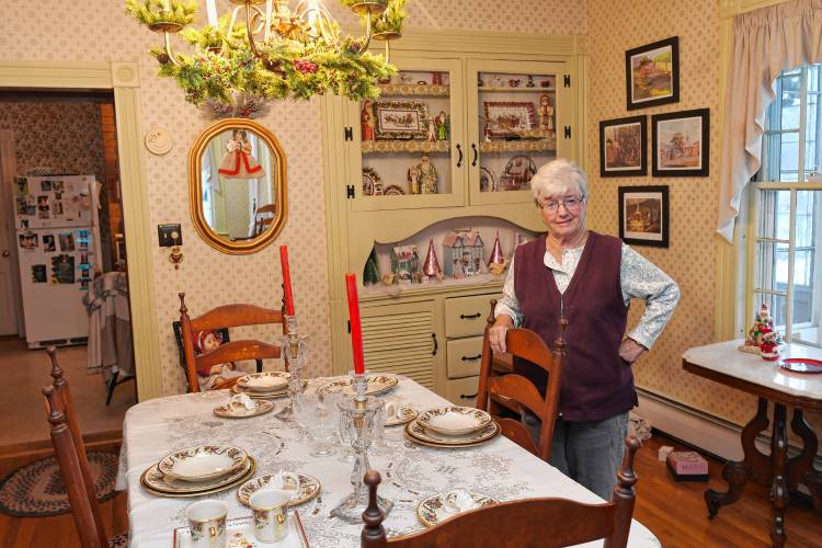 ABOVE: Joan McQuade with Christmas decorations in her Victorian Colrain home, which will be part of the historical society’s Christmas house tour, Saturday and Sunday, Dec. 2 and 3, from 10 a.m. to 4 p.m.