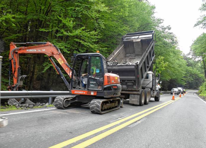Crews replace eroded shoulders along Route 116 in Conway in July.