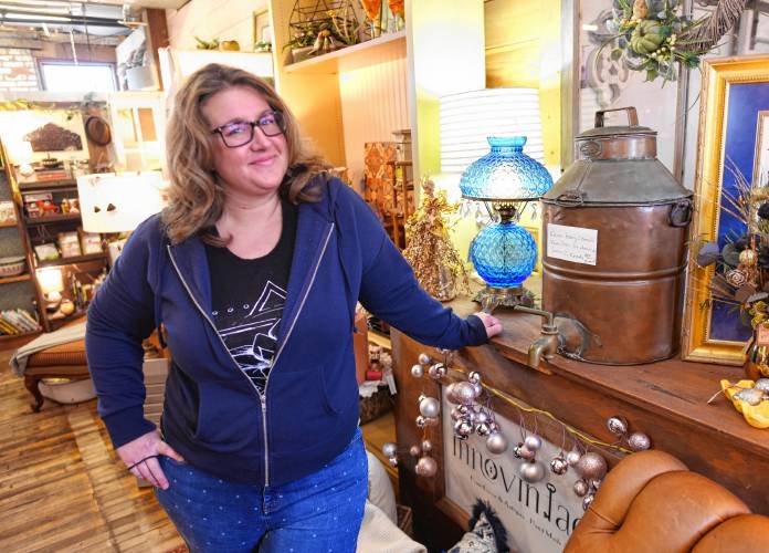 Skye Wellington with her copper boiling pot, which she attempted to sell on the reality TV show “Pawn Stars Do America,” at Innovintage Place on Hope Street in Greenfield.