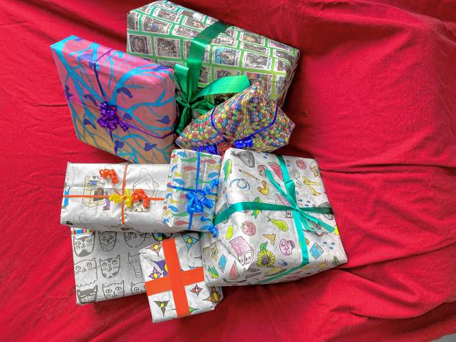 Presents wrapped in pages of the Montague Reporter’s Special Wrapping Paper Edition, available now in stores and online.