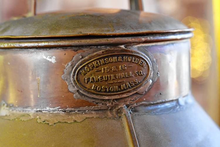 A name plate mentions Faneuil Hall and Boston on the copper boiling pot at Innovintage Place on Hope Street in Greenfield.