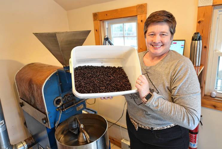 Ericka Almeida of Stout Pigeon Coffee in Turners Falls with roasted coffee.