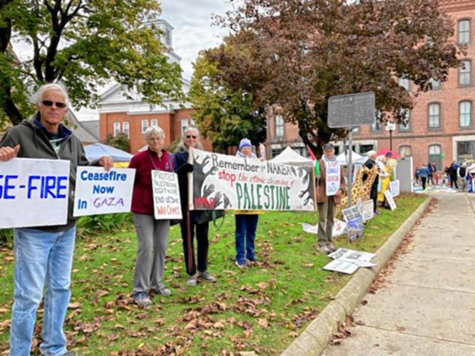 Attendees of Saturday’s weekly peace vigil on the Greenfield Common called for ceasefire in Gaza. The crisis in Gaza was sparked by a surprise Hamas incursion into Israel on Oct. 7 that killed more than 1,400 people. In response, Israel’s army launched its own assault, killing at least 2,750 people and wounding nearly 10,000.