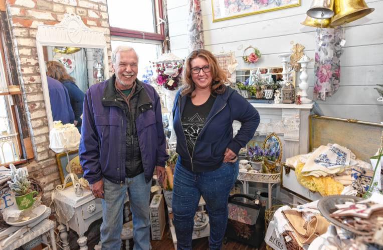Ed Bourbeau and Skye Wellington in a vendors booth at Innovintage Place on Hope Street in Greenfield.