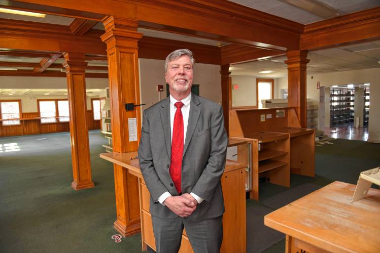 Thomas Meshako, president and CEO of Greenfield Savings Bank, inside the Leavitt-Hovey House, former home of the Greenfield Public Library. The bank officially gained ownership of the building on Wednesday.