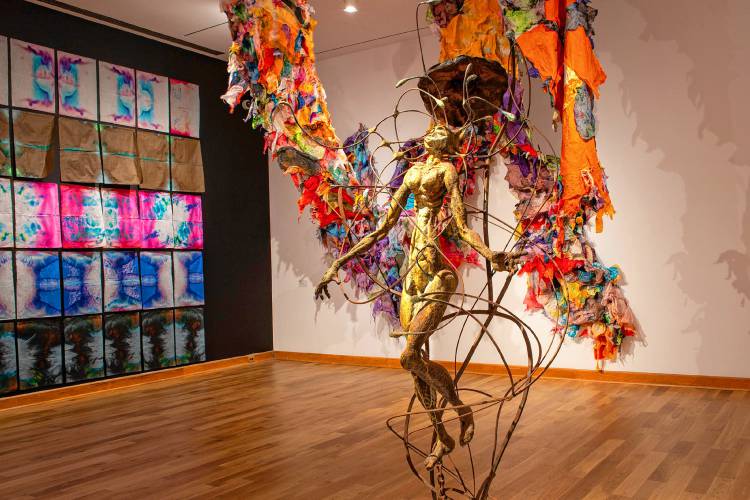 Alfred Conteh’s sculpture “Float” alongside Maya Freelon’s exuberant designs in dyed lightweight paper. 