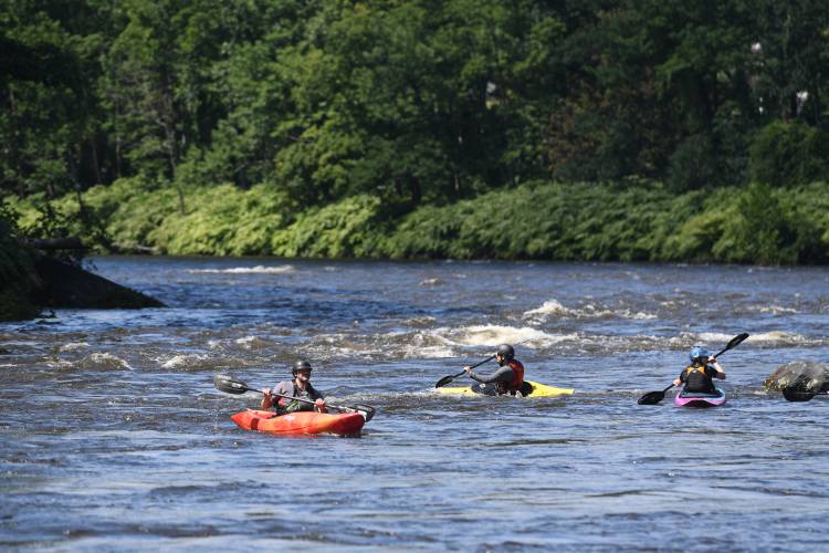 Zoar Outdoor staff members train and practice on a swollen Deerfield River in Charlemont in 2021. With the $10,000 grant it received from the Massachusetts Office of Outdoor Recreation, American Whitewater will partner with Zoar Outdoor to host Diversify Whitewater, a July 27 river rafting event on the Deerfield River that aims to remove barriers that people of color face when accessing outdoor recreation opportunities.