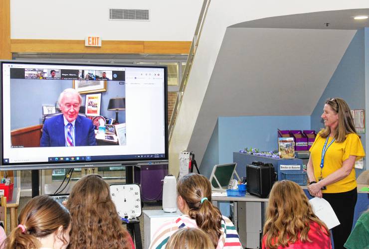 U.S. Sen. Ed Markey appears on a screen in Deerfield Elementary School’s library to speak with 52 sixth graders about proposed legislation that would update the Children’s Online Privacy Protection Act (COPPA), which he originally authored in 1998.