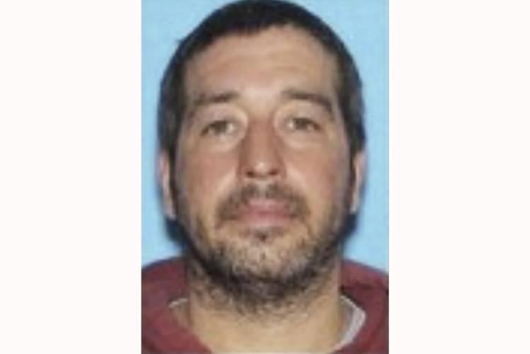 This photo released by the Lewiston Maine Police Department shows Robert Card, who police have identified as a person of interest in connection to mass shootings in Lewiston, Maine, on Wednesday, Oct. 25, 2023. ( Lewiston Maine Police Department via AP)