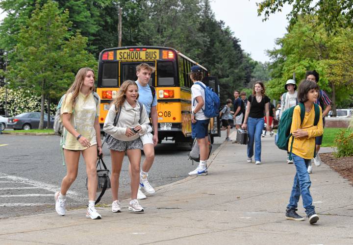 Students arrive for the first day of school at Frontier Regional School in South Deerfield on Tuesday. 